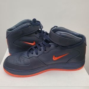 Nike Air Force 1 Sneakers – Dark Blue with Orange Swoosh Logo